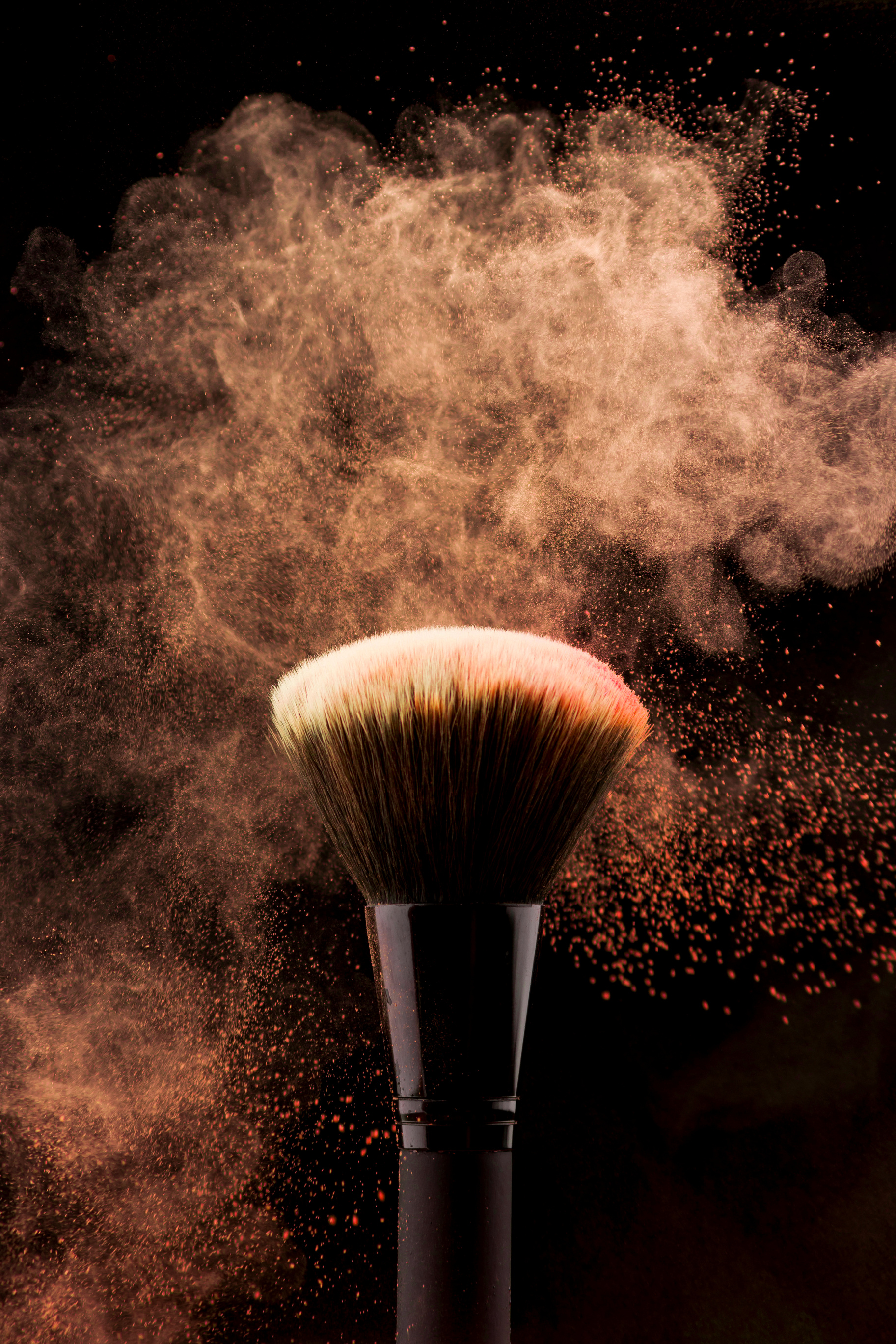 Makeup Brush with Peach Color Powder Splash